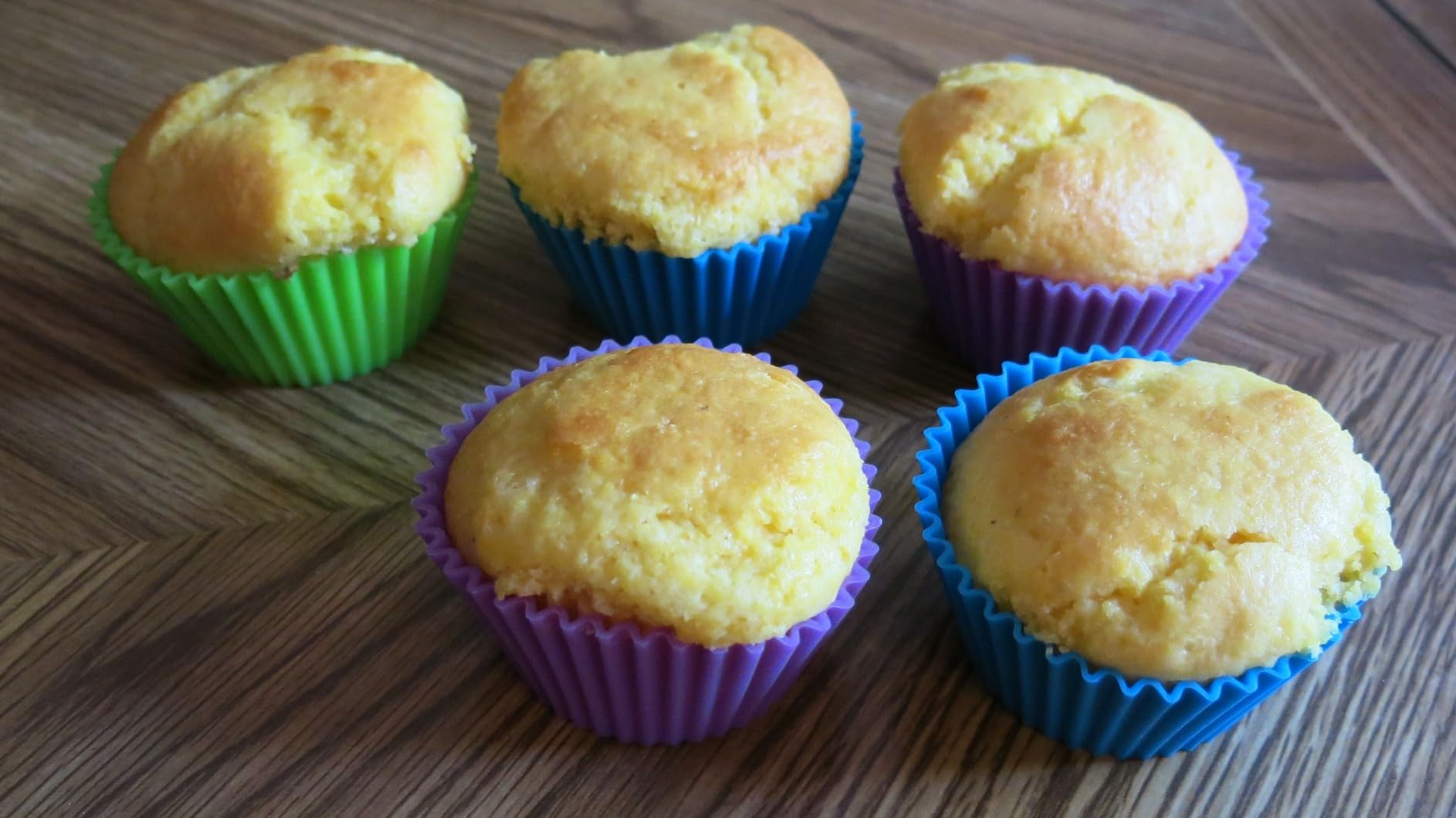 Amazon Basics Reusable Non-Stick Silicone Baking Cups, BPA Free, Muffin Liners, Dishwasher Safe, Microwave and Oven Safe, 2.9 x 2.9 x 1.3 in (LxWxH), Multicolor, 12-Pack customer photo 2