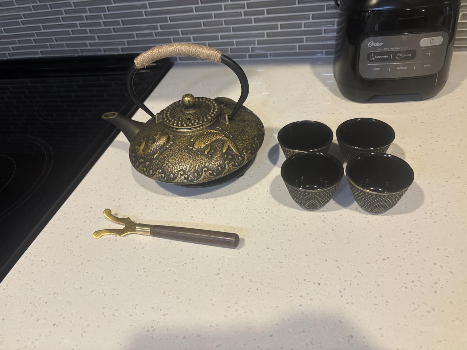 Ufine Blue Floral Cast Iron Teapot Set Japanese Style Tetsubin Tea Kettle with 4 Cups, Stainless Steel Infuser for Stove Top Tea Brewing 28 oz customer photo 1