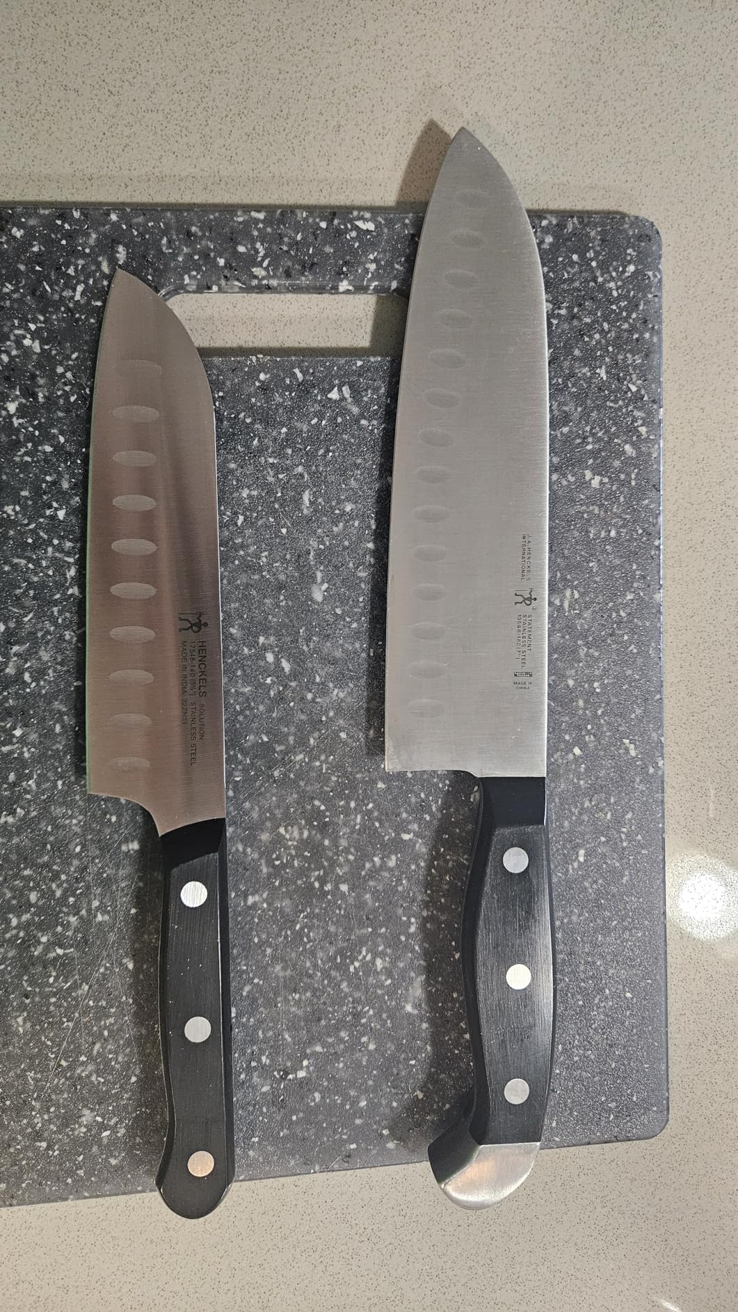 HENCKELS Solution Razor-Sharp Hollow Edge Santoku Knife 5.5 inch, German Engineered Informed by 100+ Years of Mastery, Black/Stainless Steel customer photo 2