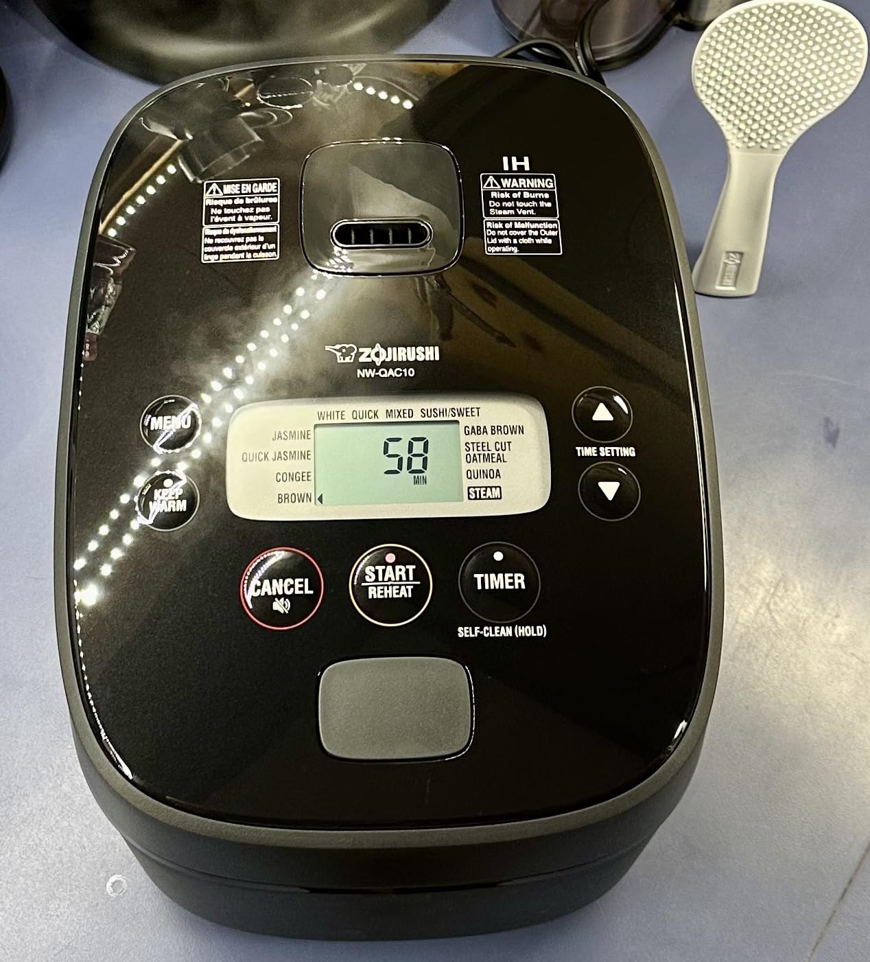 Zojirushi NW-QAC10 5.5-Cup Capacity Flat-Top Induction Cooker and Warmer with Custom Cooking Pan, Double Non-Stick Coating for Easy Clean-Up (Black) customer photo 2