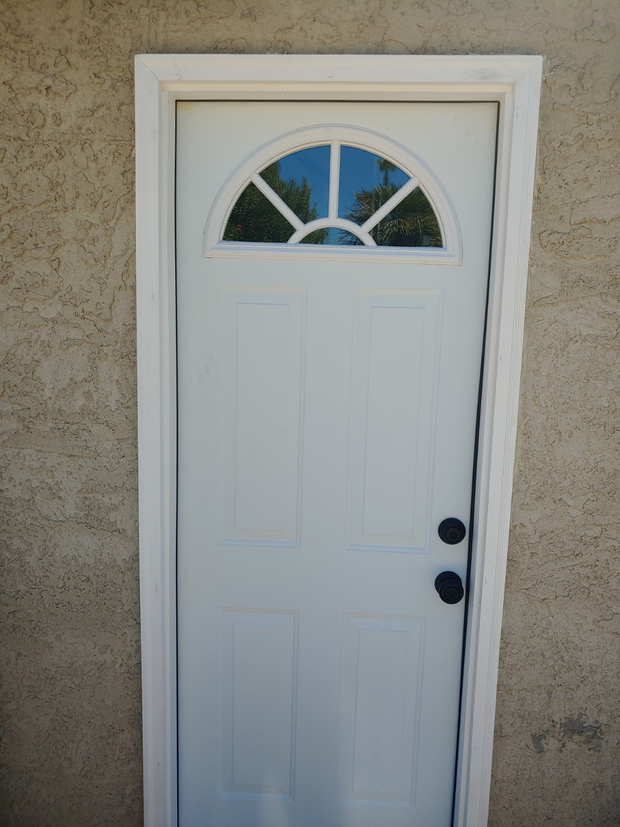 National Door Company ZZ00717R Steel Primed, Right Hand in-Swing, Prehung Front Door, Wagon Wheel 1/4 Lite 4-Panel, Clear Glass, 30