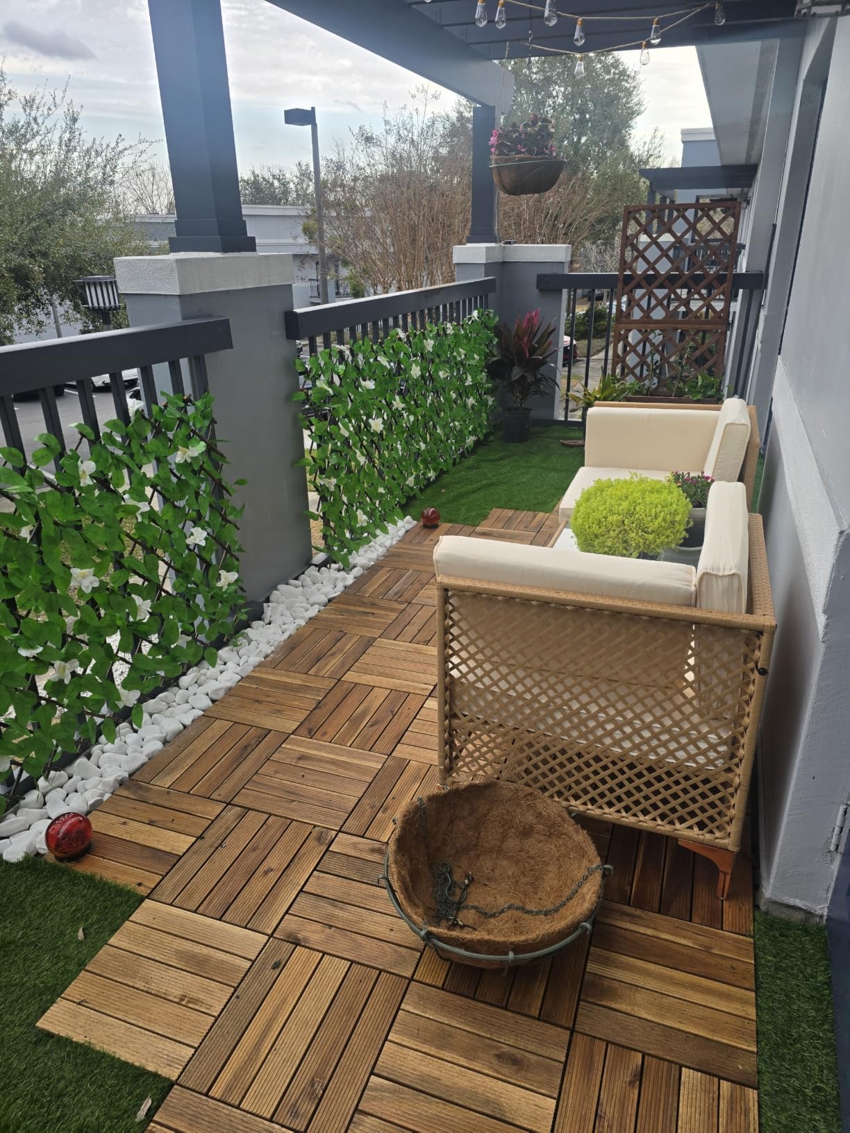Yaheetech 27PCS Interlocking Deck Tiles Outdoor Patio Floor, Black | Acacia wood on snap-together PP bases covers concrete patios, decks and balconies, cuts to fit, and feels smooth underfoot. customer photo 2