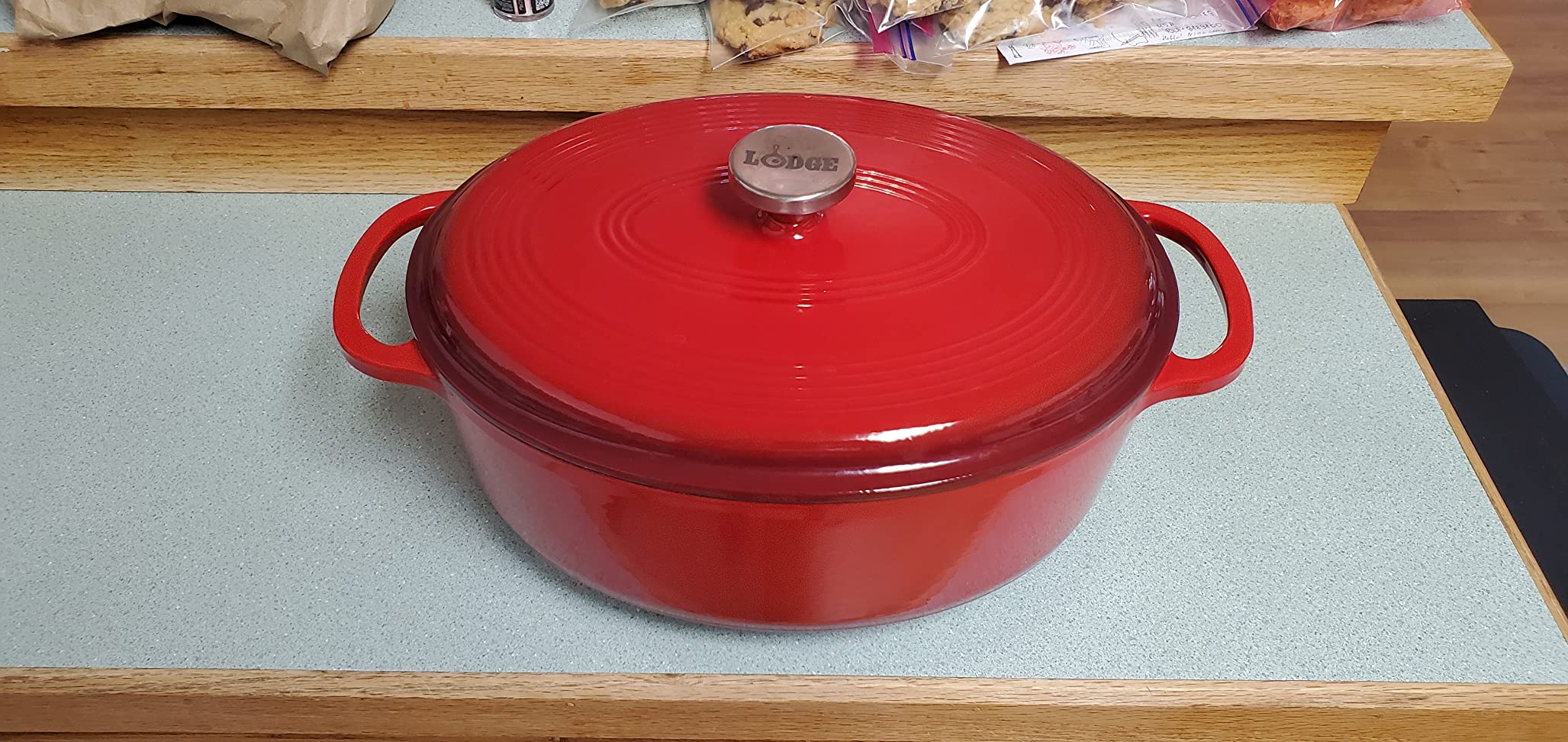 Lodge Oval Dutch Oven - Enameled Cast Iron Oval Dutch Oven with Lid - Family Size Cooking Pot with Dual Handles for Sourdough Bread Baking & Everyday Cooking - 7 Quart - Red customer photo 1