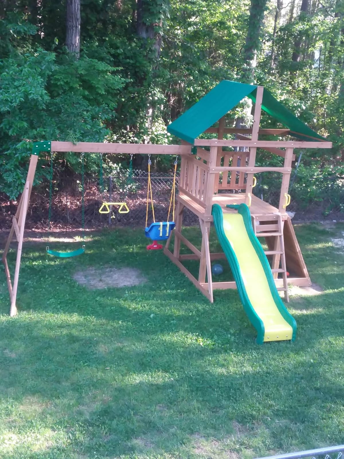 Backyard Discovery Mount Mckinley Cedar Wood Swing Set with Wave Slide, Play Deck, Double Rock Wall, Rope Ladder, Web Swing, Belt Swings, Toy Telescope, Steering Wheel, Sandbox Area, Outdoor Playset customer photo 1
