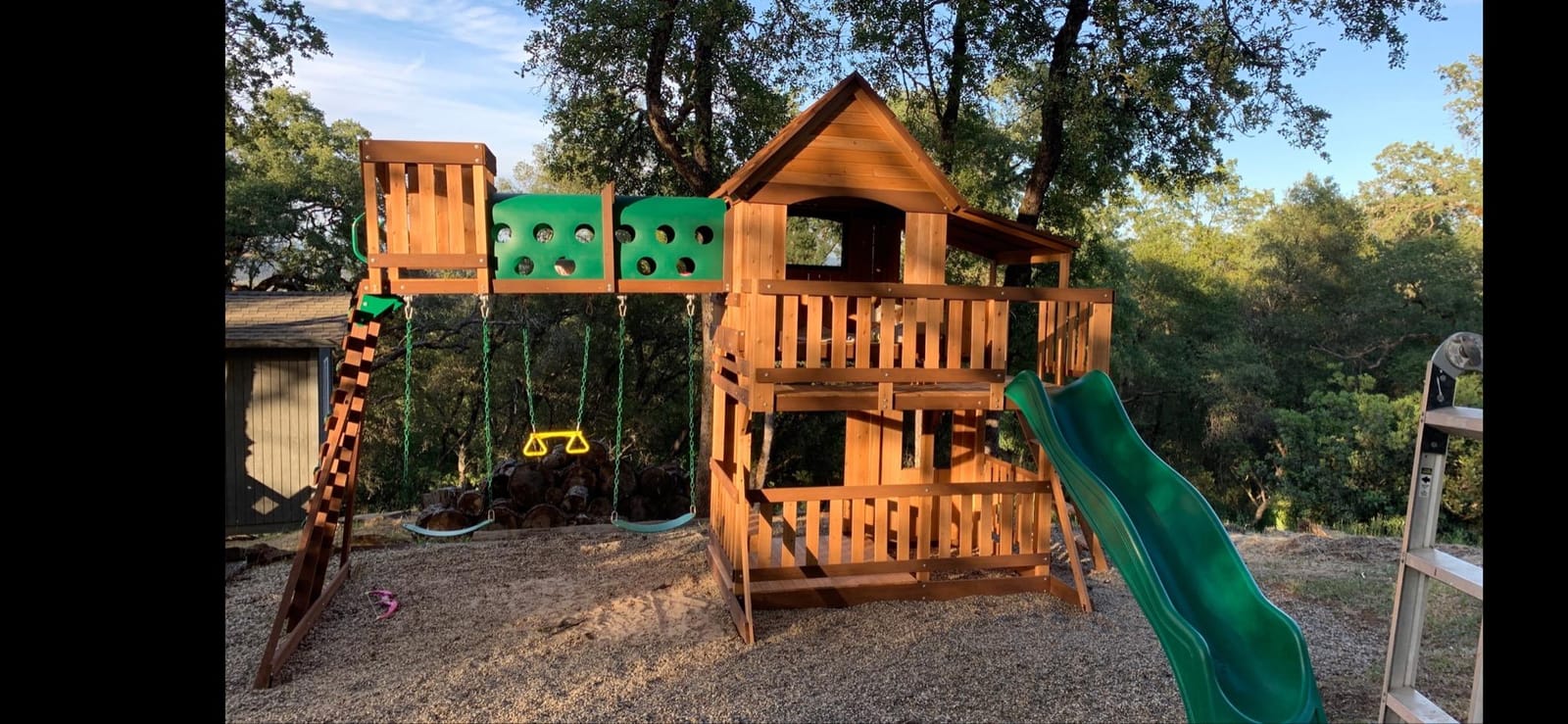 Backyard Discovery Woodridge Elite Cedar Wood Swing Set with Wave Slide, Clubhouse, Crawl Tunnel, Crow's Nest, Belt Swings, Trapeze, Rock Wall Ladder, Sandbox, Wrap-Around Porch, Deck, Outdoor Playset customer photo 2