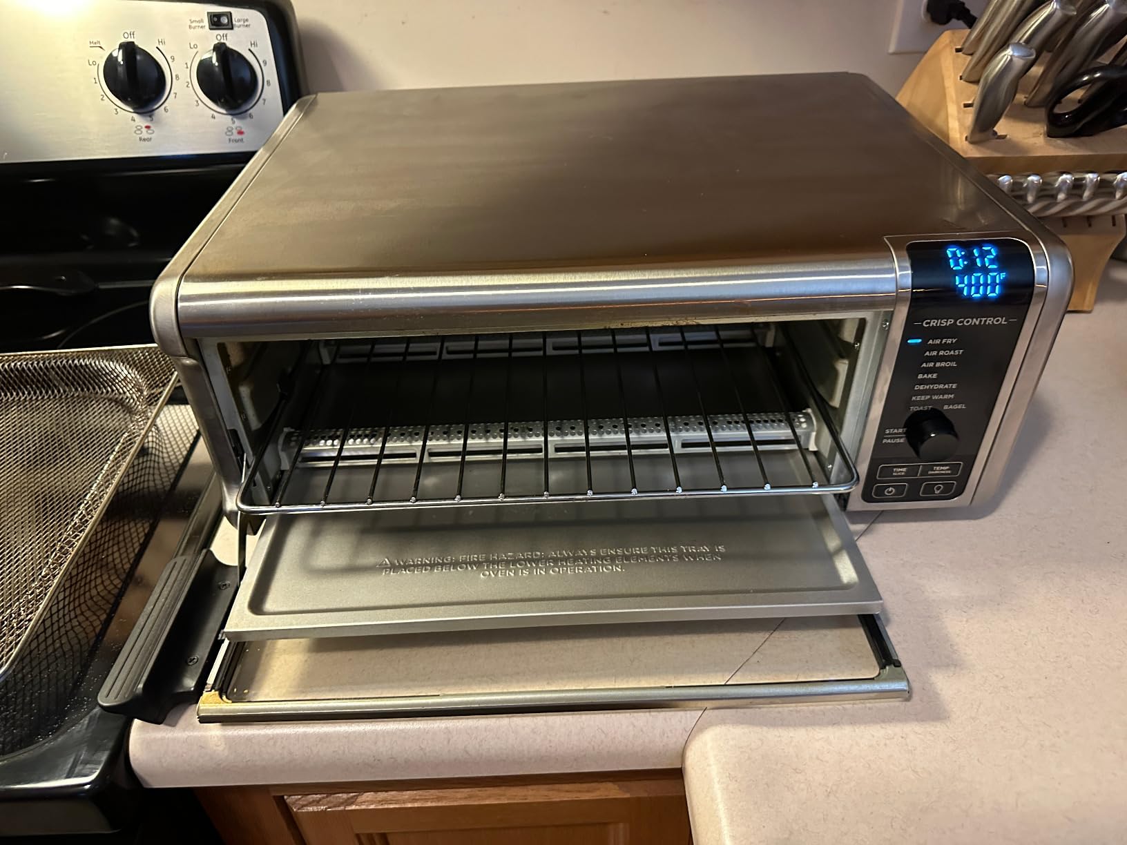 Ninja Digital Air Fry Countertop Oven, 8-in-1, XL, Silver, SP101 | Air fry, air roast, broil, bake, toast, bagel, dehydrate, keep warm, 1800W, Flip up & away customer photo 2
