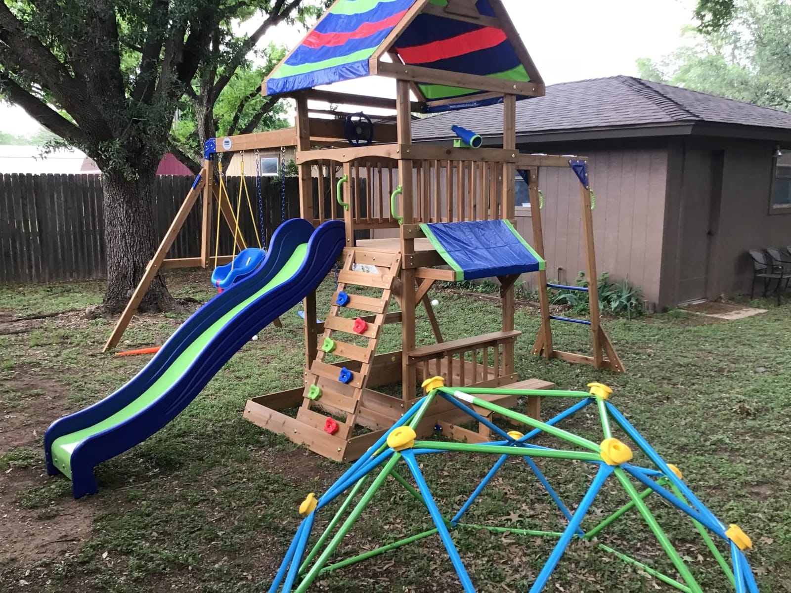 Backyard Discovery Belmont Cedar Wood Swing Set with Wave Slide, Play Deck, Rock Wall Ladder, Snack Bar Window, Shaded Picnic Area, Bench, Belt Swings, Trapeze, Sandbox Area, Canopy, Outdoor Playset customer photo 2
