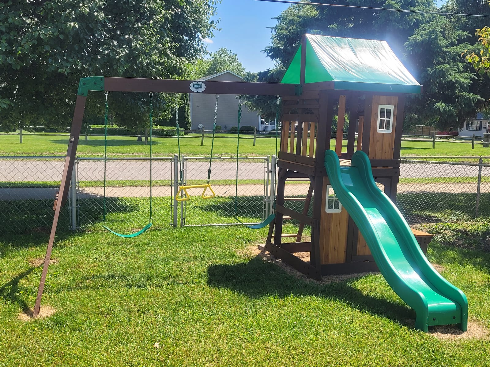 Backyard Discovery Lakewood Cedar Wood Swing Set with Wave Slide, Clubhouse, Playhouse, Snack Bar Window, Picnic Area, Belt Swings, Trapeze, Full Front Door, Windows, Step Ladder, Outdoor Playset customer photo 1