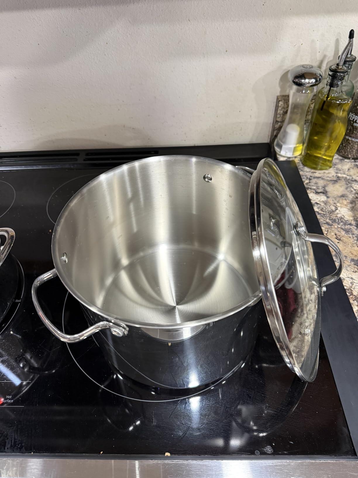 Amazon Basics Stainless Steel Induction Compatible Stock Pot with Glass Lid, Oven Safe, Dishwasher Safe, Sturdy, 8 Quart, Silver customer photo 1