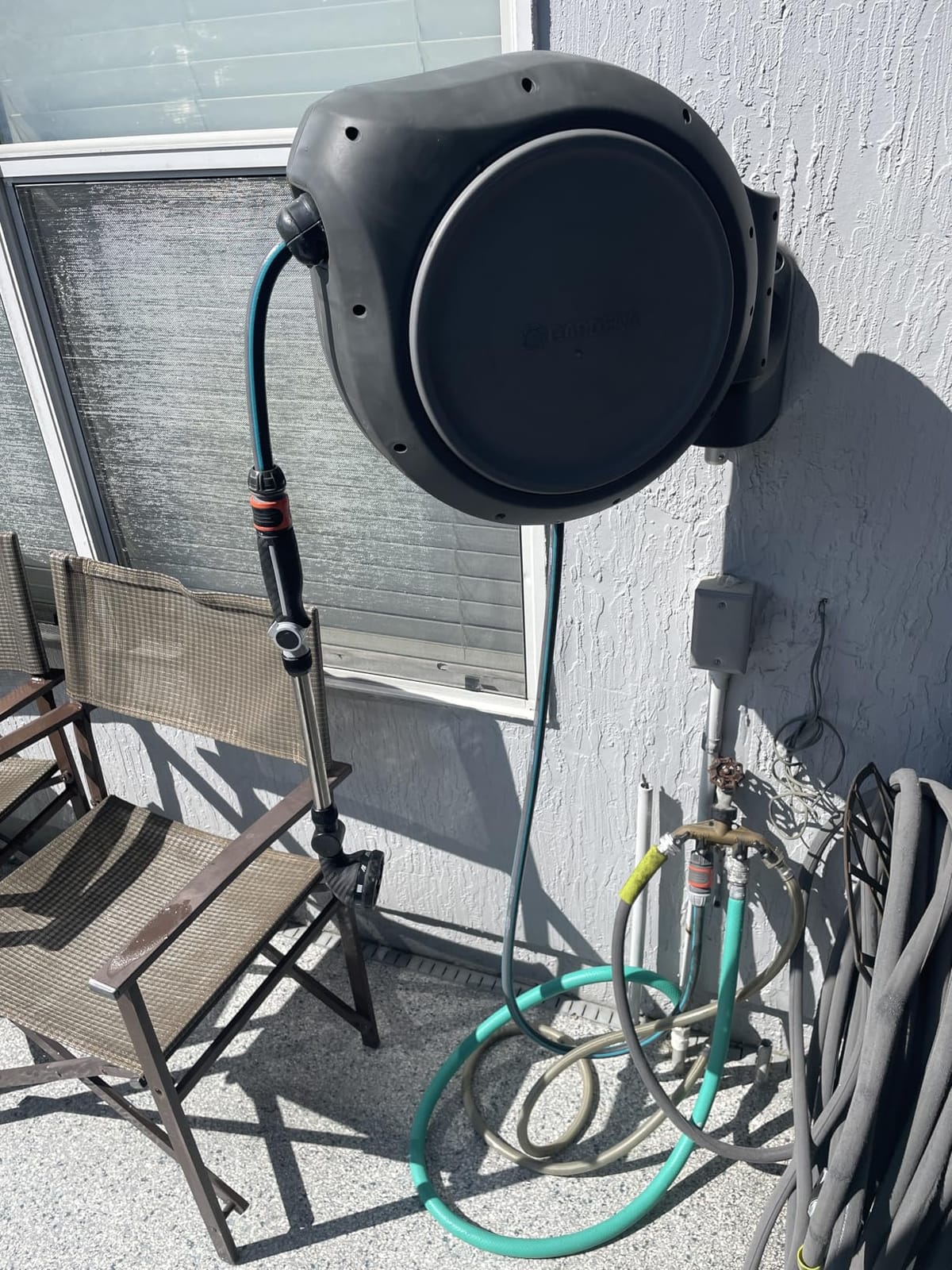 GARDENA Retractable Garden Hose Reel - 100 Feet - Auto Retract Hose Reel with 180° Swivel Wall Mount customer photo 1
