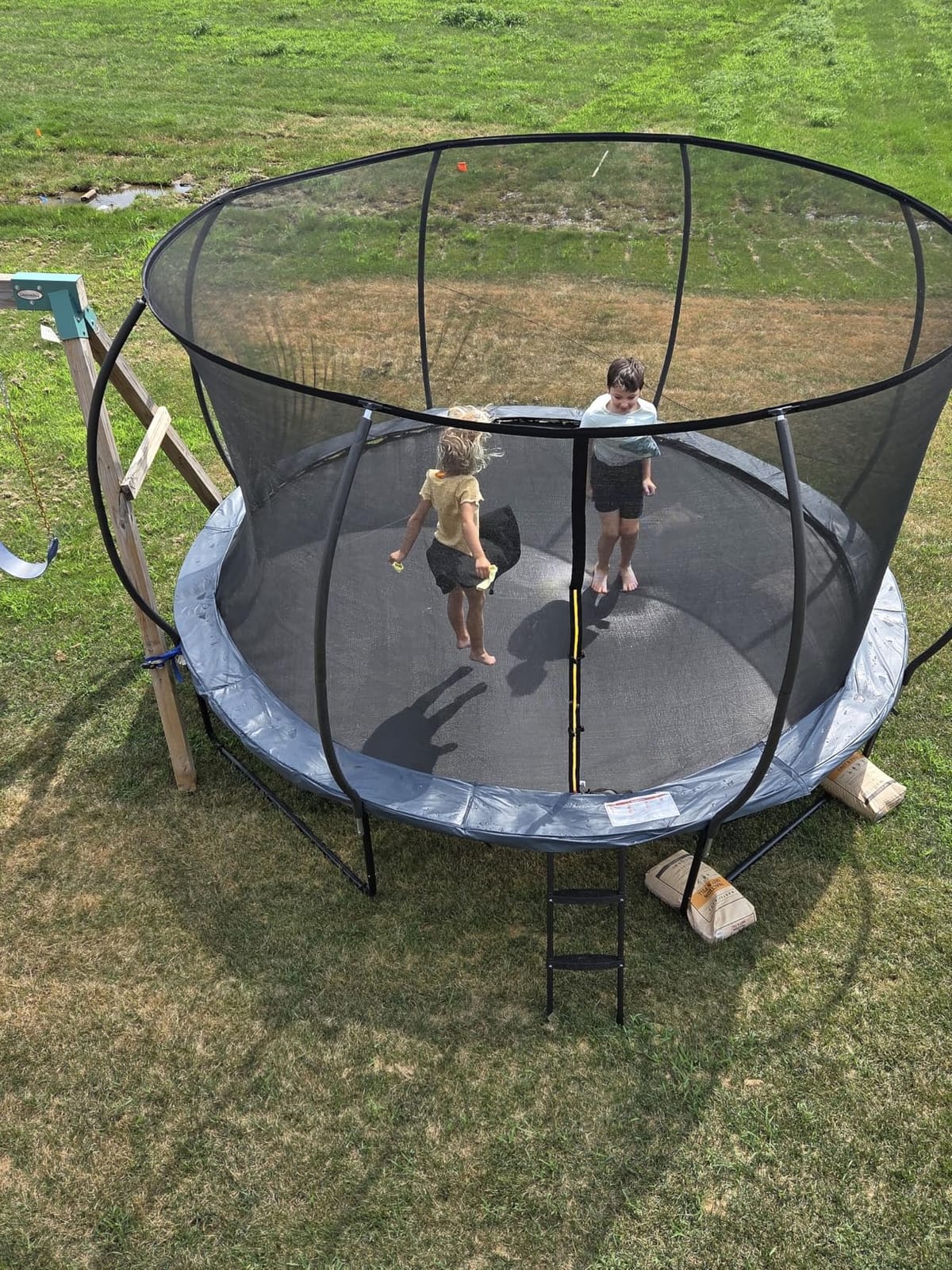 Jumpzylla Outdoor Trampoline with Net for Kids 8FT 10FT 12FT 14FT 15FT 16FT | ASTM-compliant trampoline with enclosure, non-slip ladder, rust-resistant galvanized steel frame, 8FT-16FT for kids & adults customer photo 2