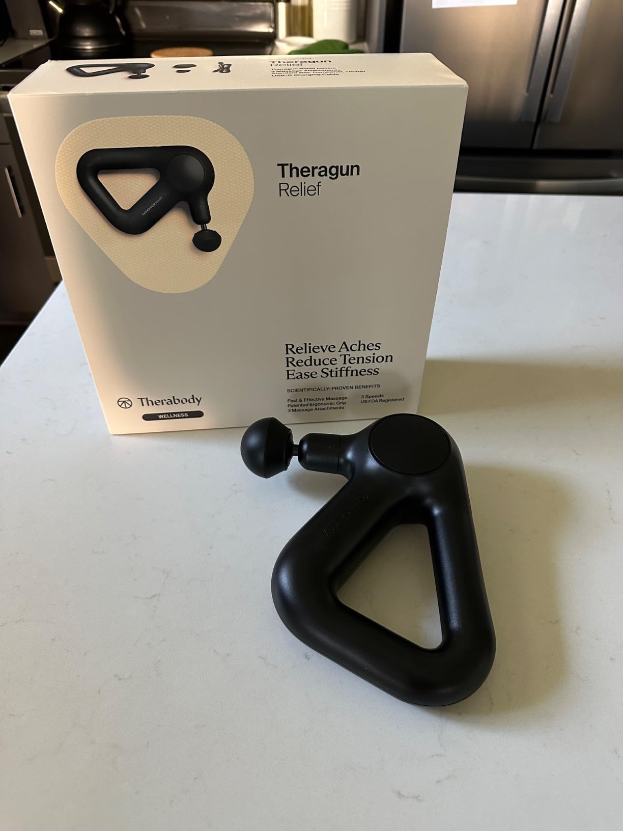 TheraGun Therabody Relief Massage Gun | for Daily Comfort | 3-Speed | Black | Quiet Handheld Percussion Muscle Massager for Back, Leg & Shoulder Pain Relief. Lightweight, Easy to Use, Ergonomic Grip customer photo 1