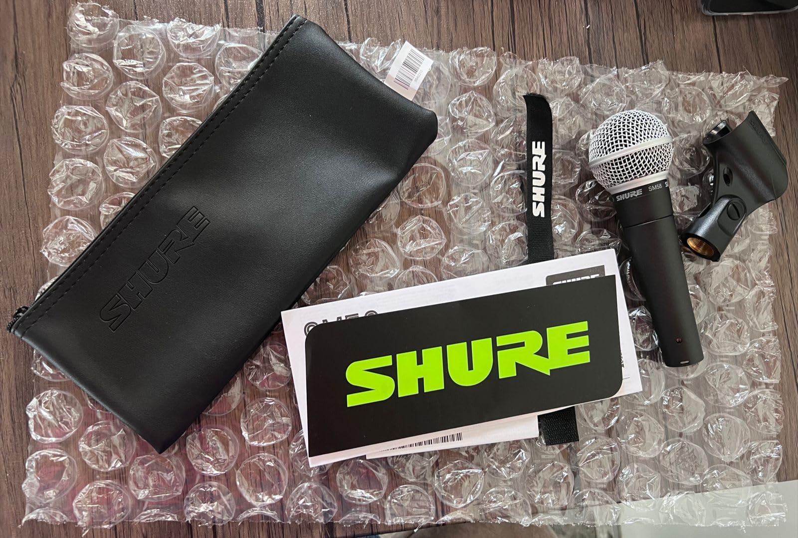 Shure SM58 Pro XLR Dynamic Vocal Microphone | Cardioid dynamic vocal mic for studio and live performance, podcasting and recording; industry-standard sound customer photo 1