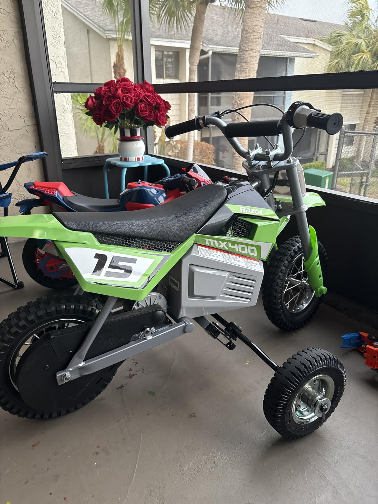Razor MX400 Dirt Rocket Electric Bike for Kids Ages 8+, 140 Pounds Max Weight, Green - 24-Volt Battery, up to 14 Mph, 30-Minute High Speed Ride Time, Twist-Grip Throttle, 12-Inch Pneumatic Tires customer photo 1