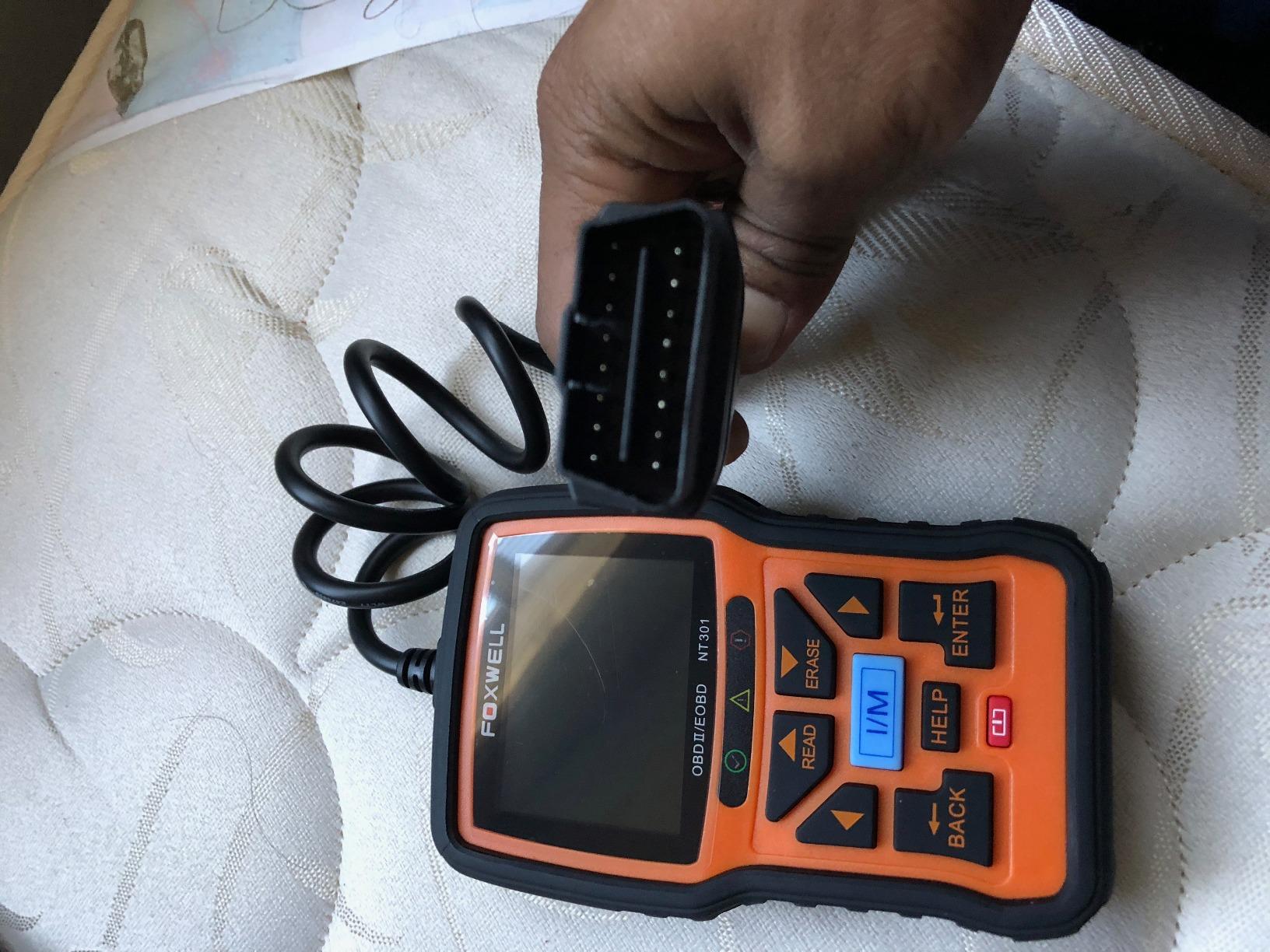 FOXWELL NT301 OBD2 Scanner Live Data Professional Mechanic OBDII Diagnostic Code Reader Tool for Check Engine Light customer photo 1