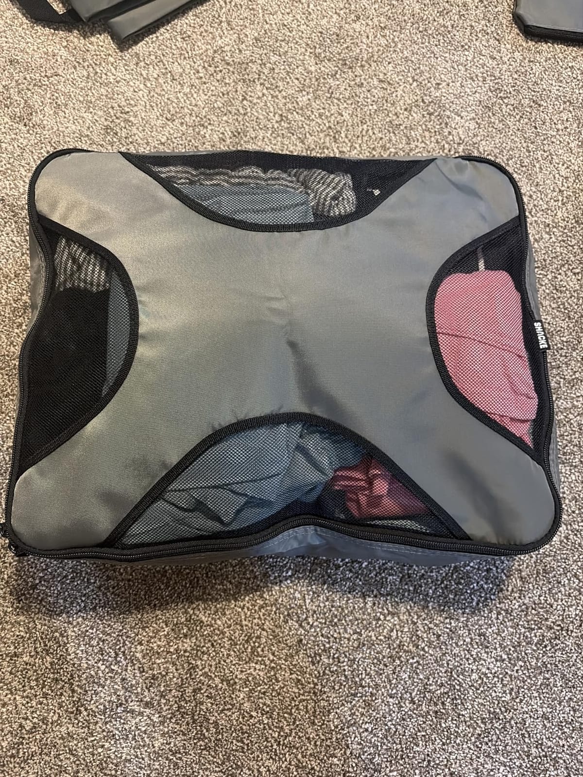 Shacke 5 Set Packing Cubes for Travel with Laundry Bag (Pure Black) - Suitcase Organizer Bags Set: 4 Water-Resistant Luggage Cubes, XL to Small, + Laundry Bag for Carry-On or Checked customer photo 2