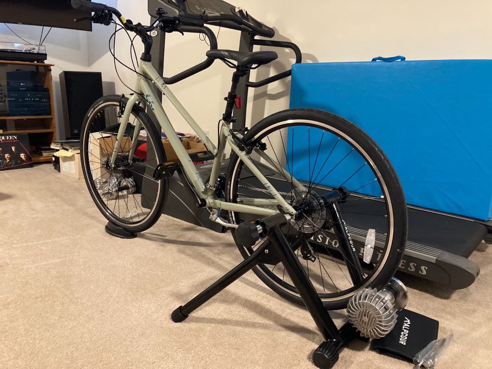 Alpcour Fluid Bike Trainer Stand for Indoor Riding - Portable Foldable Stainless Steel Trainer, Noise Reduction, Progressive Resistance, Dual-Lock System - Road & Mountain Bikes' Stationary Exercise customer photo 1
