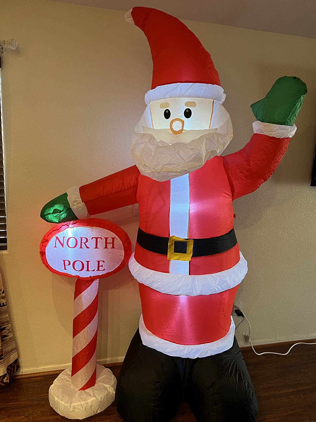 MorTime 8 FT Christmas Inflatable Santa Claus with Guidepost, Blow up Lighted Giant Wave Santa Claus North Pole with LED Lights Yard Decoration Party Display for Xmas Outdoor Decorations customer photo 1