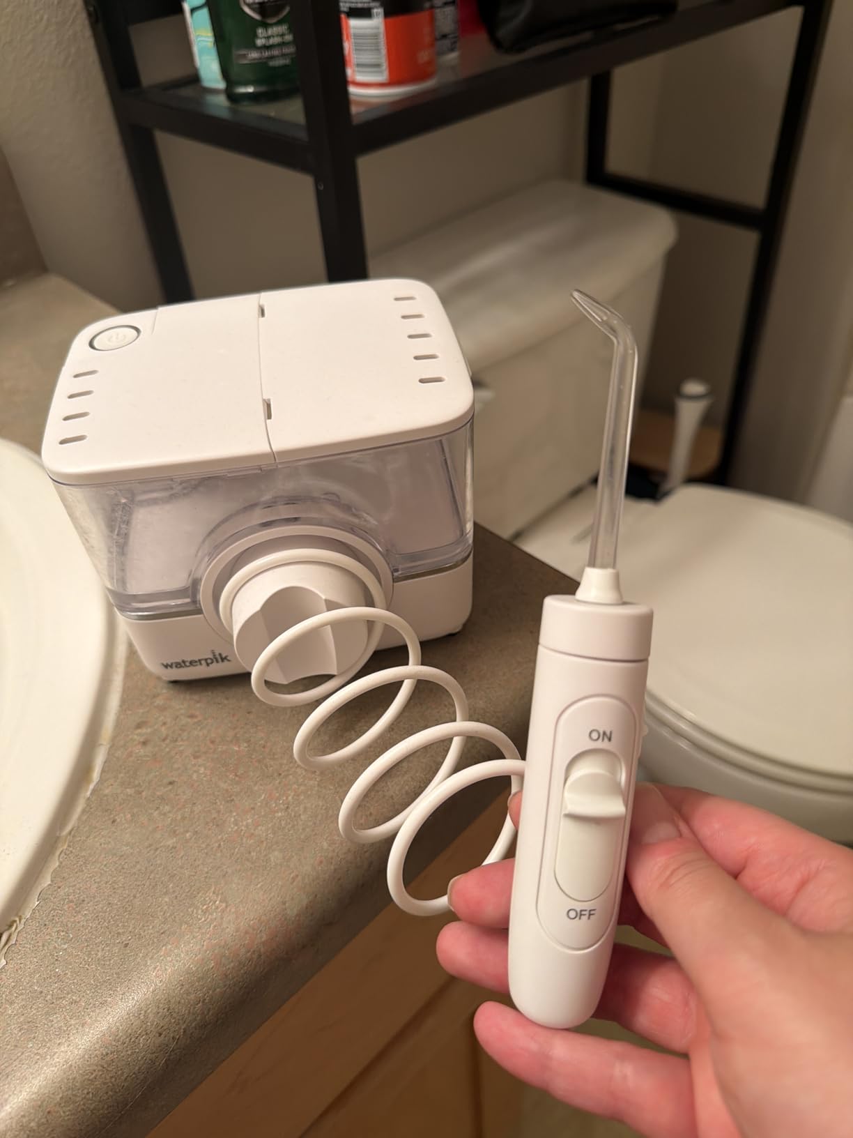 Waterpik ION Rechargeable Water Flosser with 10 Settings, 7 Tips, White | Portable Cordless Countertop for at Home Daily Gum Health, Dental Braces, Implants, ADA Accepted, WF-12 Packaging May Vary customer photo 2