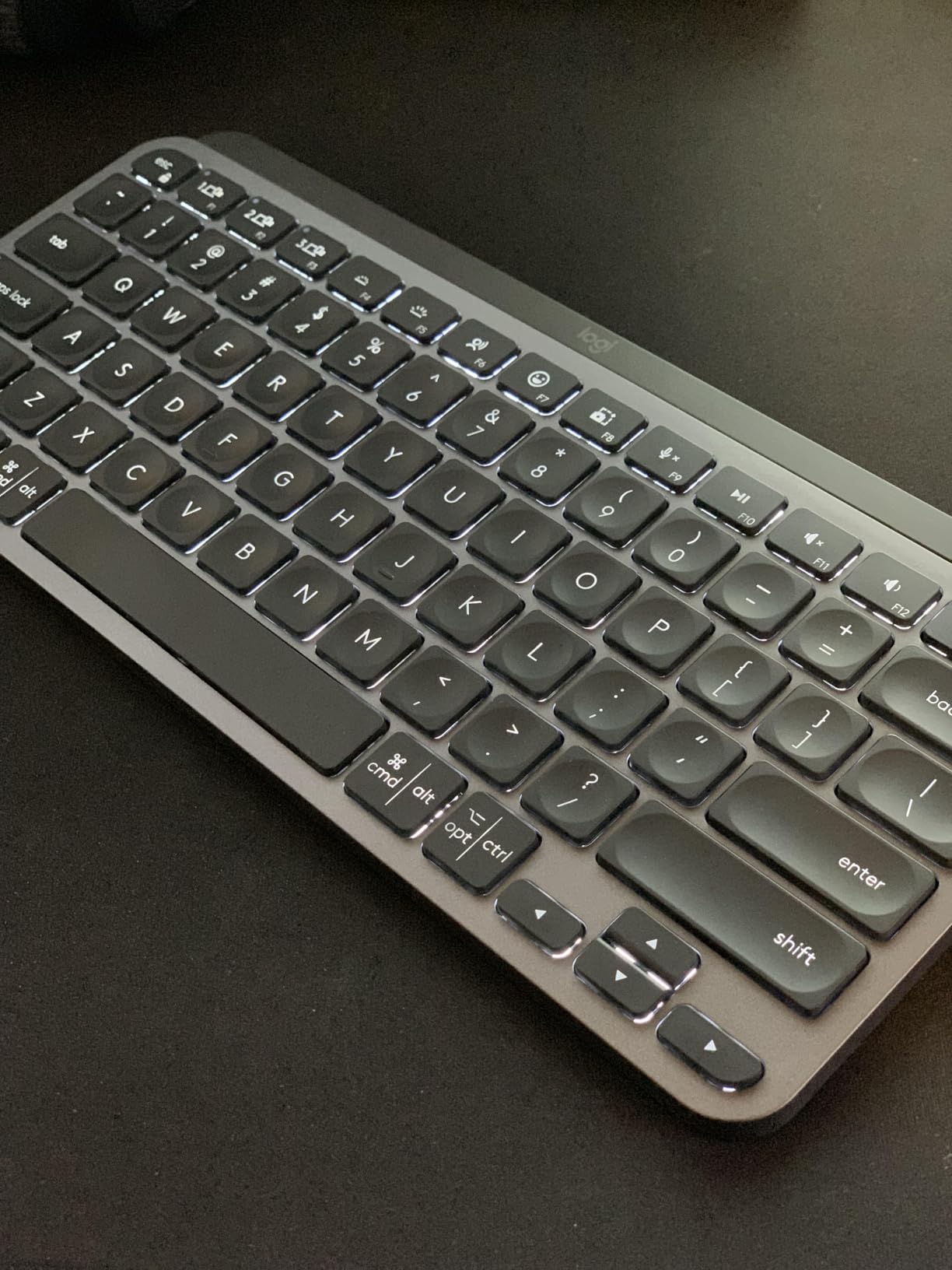Logitech MX Keys Mini Minimalist Wireless Illuminated Keyboard - Graphite | USB-C rechargeable, pairs with 3 devices via Bluetooth, Smart keys flow, compatible with macOS/ iOS/Windows/Linux/Android customer photo 1