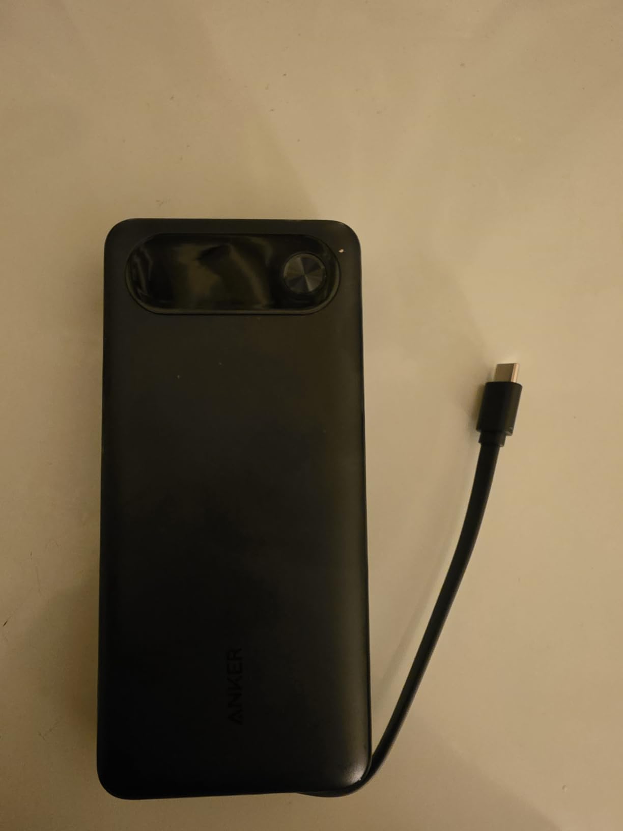 Anker Power Bank, 20,000mAh Travel Essential, Built-in USB-C Cable(Black) | 3-Port 87W Max Fast Charging Battery Pack, for MacBook, iPhone 16 / 15 Series, Samsung, Switch, and More customer photo 1