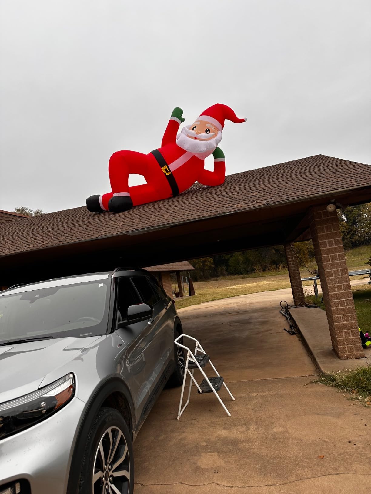 Juegoal Christmas Inflatables Outdoor Decorations, 12FT Long Inflatable Xmas Santa Claus, Lighted Blow Up Giant Lying Santa with Built in LED Lights, Light Up Holiday Winter Lawn Yard Garden Decor customer photo 1