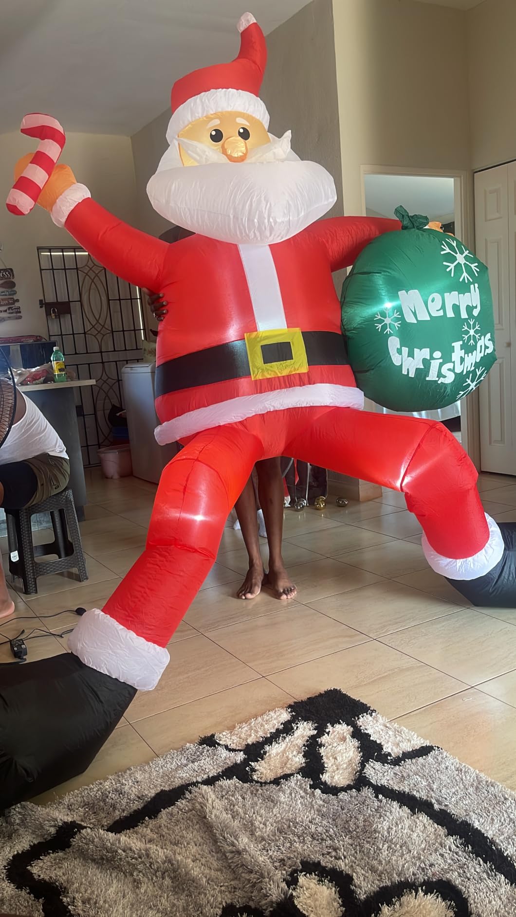 8 FT Christmas Inflatable Santa Claus Outdoor Decorations, Blow up Sitting Santa Claus with Gift Bag, Climbing Santa Carrying Present Sack Sitting on Roof, Xmas Yard Patio Bench Shrubs Indoor Decor customer photo 1