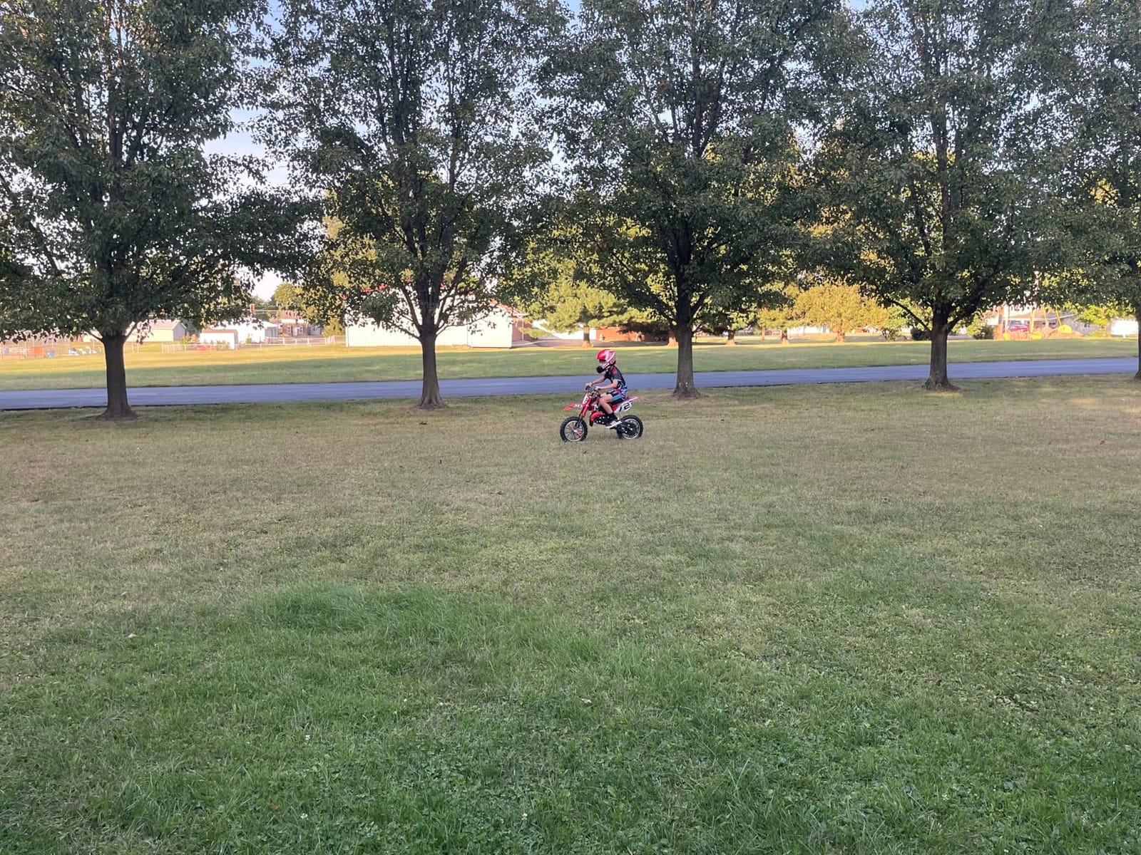 Kids Dirt Bike 50cc Gas Powered 2-Stroke, Mini Dirt Bike with Inverted Front Fork, Dual Hydraulic Disc Brakes, 24 MPH Max Speed, 19 Mile Range, Easy Pull Start, Off Road Pit Bike for Kids, Red customer photo 1