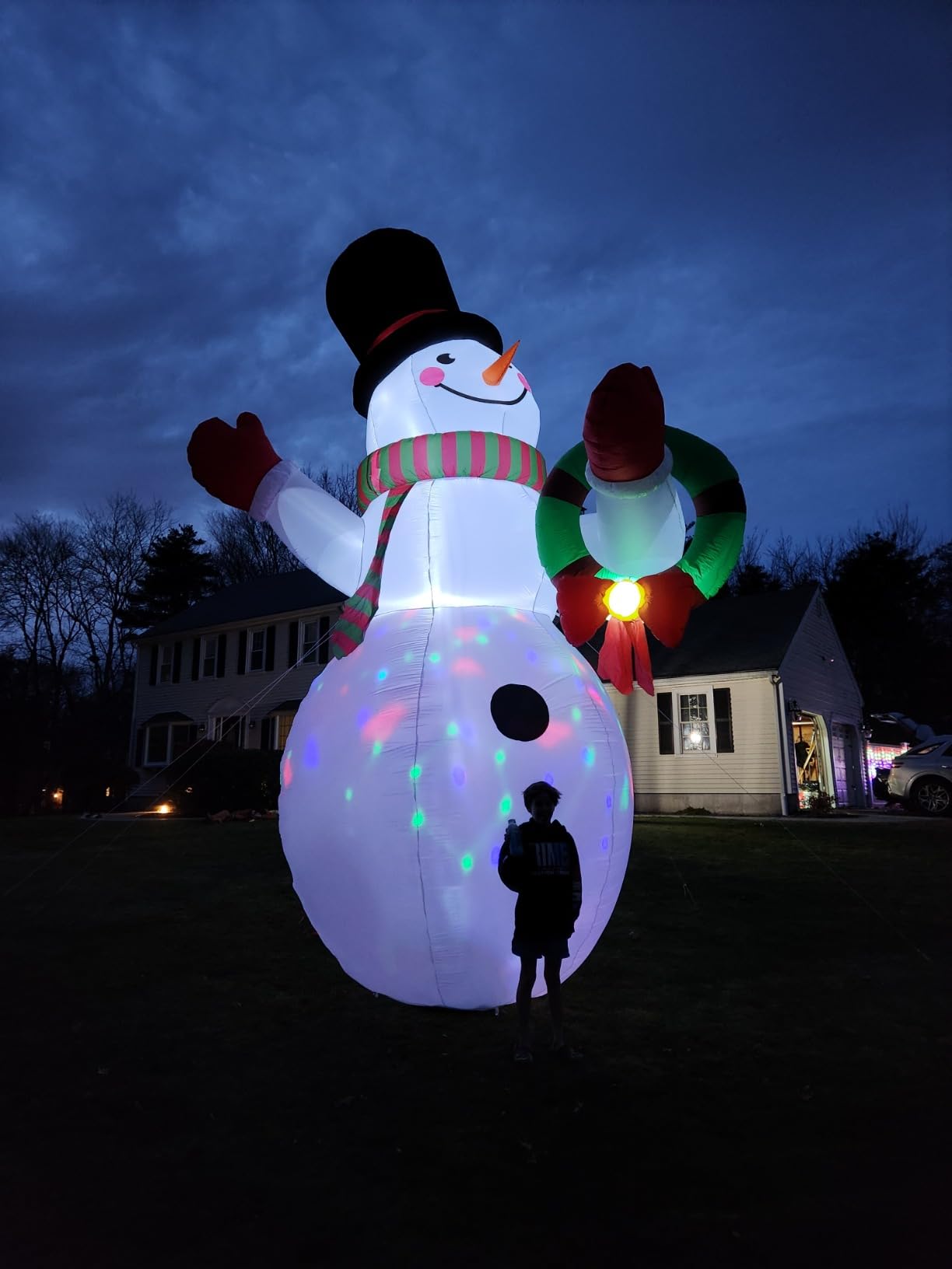 Danxilu 12 FT Giant Inflatable Snowman Christmas Outdoor Decorations | Colorful Rotating Lights, Giant xmas decor blow up snow man w/ wreath & top hat for yard lawn, Waterproof Durable, Easy Setup customer photo 1